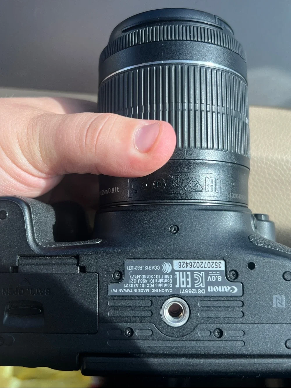 Canon Black DSLR with Zoom Lens